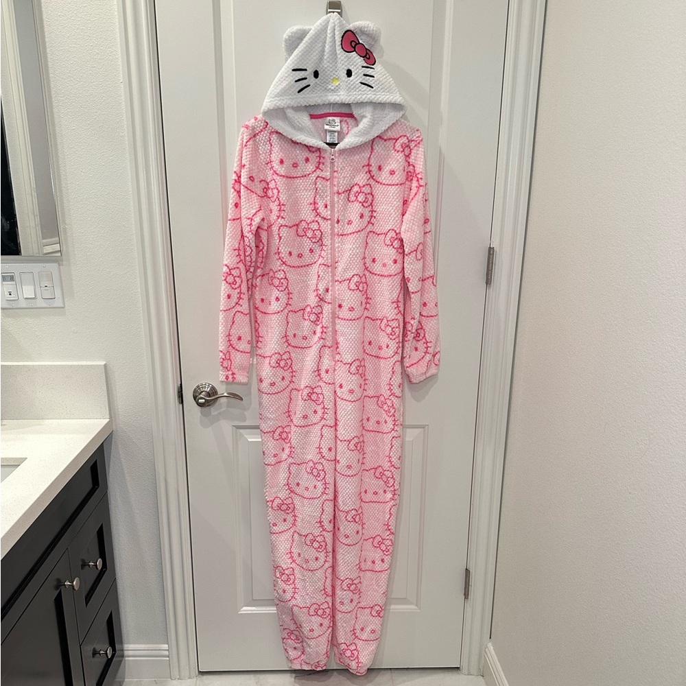 Hello Kitty Onesie Size: Medium & Small 🎀
